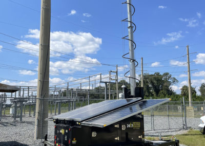Mobile Surveillance Trailer - S-Series monitoring a substation for enhanced security and safety. Solar-powered CCTV trailer providing comprehensive surveillance and protection for critical infrastructure.